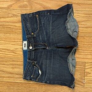 Paige cut-off dark wash mid-rise denim shorts with 5" inseam, 26*